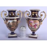 A LARGE PAIR OF 19TH CENTURY DERBY TWIN HANDLED PORCELAIN VASES painted with floral sprays and lands