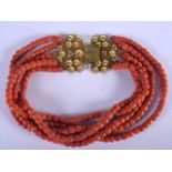 AN 18CT GOLD MOUNTED CORAL NECKLACE. 288 grams. Each strand 40 cm long.