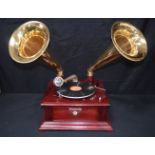 A reproduction gramophone player 34 x 34 cm.