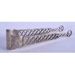 A PAIR OF GEORGE III SILVER SUGAR TONGS. 37 grams. 15 cm x 3.5 cm.