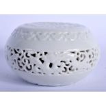 A 19TH CENTURY CHINESE BLANC DE CHINE PORCELAIN CIRCULAR CENSER SCROLL WEIGHT bearing Qianlong to ba