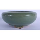AN EARLY 20TH CENTURY CHINESE GREEN GLAZED CIRCULAR CENSER Ming style. 24 cm diameter.