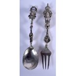 AN EXTREMELY RARE PAIR OF 18TH/19TH CENTURY CONTINENTAL SILVER UTENSILS of highly unusual form. 254