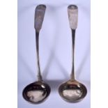 A PAIR OF ANTIQUE SCOTTISH SILVER LADLES. 50 grams. 14 cm long.