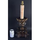 A LARGE 19TH CENTURY BOHEMIAN ISLAMIC STYLE RUBY GLASS CANDLESTICK painted with gilt foliage and mot