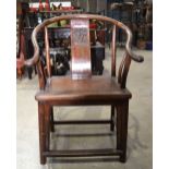 A Chinese hardwood chair with a carved back panel 97 x 66 x 53 cm.