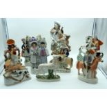 A collection of Staffordshire flatback figures 39cm (9).