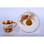 Royal Worcester coffee cup and saucer painted with highland cattle by H. Stinton, signed, date mark