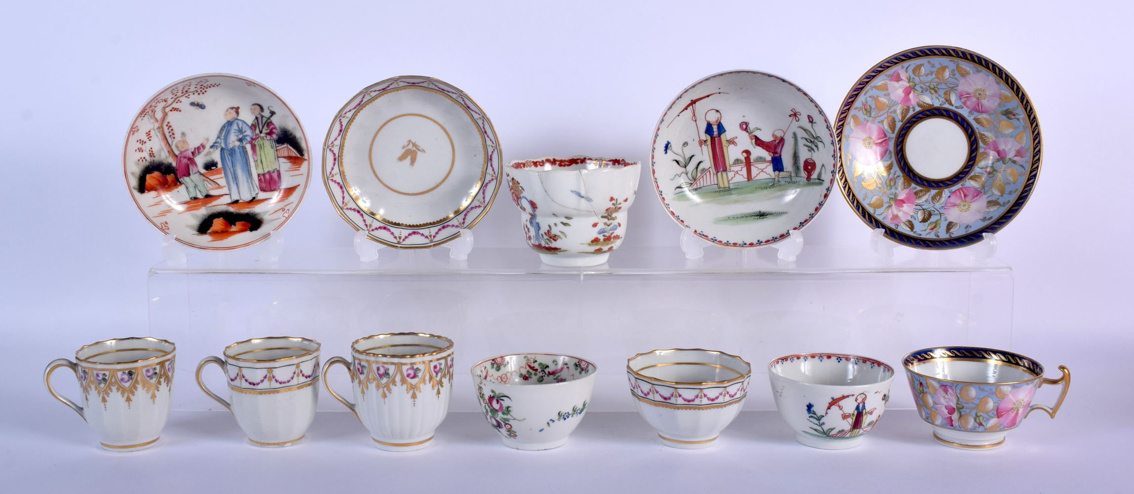 A collection of 18th c. New Hall: Tea bowl and saucer with oriental figures pattern 20, a rare trio