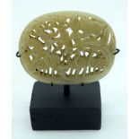 A Chinese Jade Plaque on a stand decorated with birds 7cm. (2)