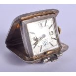 AN ART DECO SILVER TRAVELLING WATCH. 55 grams. 5 cm x 4 cm.