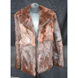 A Fur coat. 76cm.