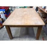 A large oak rectangular dining table 78 x 183 x 118cm.