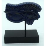 A Lapis Lazuli carving mounted on a stand 9 x 6.5cm.