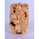 A JAPANESE CARVED BONE NETSUKE modelled as numerous insects. 5 cm x 3 cm.