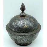 A 19th C Islamic iron box and cover decorated with White metal and gilt calligraphy 28cm.