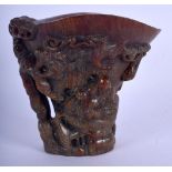 A CHINESE CARVED BUFFALO HORN STYLE LIBATION CUP 20th Century. 14 cm x 11 cm.