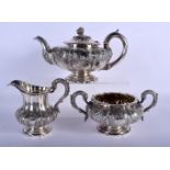 AN EARLY 19TH CENTURY ENGLISH SILVER TEASET. London 1829. 1651 grams. Largest 28 cm x 15 cm. (3)