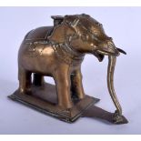 AN 18TH CENTURY INDIAN BRONZE ELEPHANT modelled upon a rectangular base. 15 cm x 20 cm.
