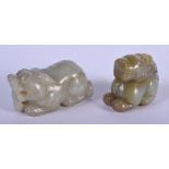 TWO EARLY 20TH CENTURY CHINESE CARVED JADE BEASTS. Largest 6 cm x 3 cm. (2)