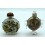 A pair of Chinese reverse painted snuff bottles 9cm (2)