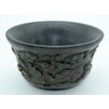 A Chinese carved horn Libation cup 7 x 13cm.