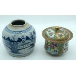 A Small Chinese Famille Rose lidded pot decorated with figures and foliage and a ginger jar