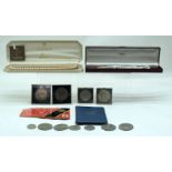 Miscellaneous collection of coins, crowns and two sets of simulated pearls necklaces (15).