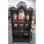 A RARE 19TH CENTURY CHINESE CARVED HARDWOOD HONGMU DISPLAY CABINET of almost European architectural