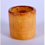 A CHINESE CARVED BONE ARCHERS RING 20th Century. 2 cm wide.