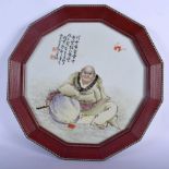 A CHINESE REPUBLICAN PERIOD FAMILLE ROSE PORCELAIN PLAQUE painted with a buddha and calligraphy. 34