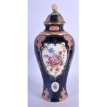 Royal Worcester vase and cover painted with flowers on a blue scale ground with red cell panels by E