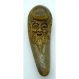 A Chinese carved horn figure of a sage 13cm.