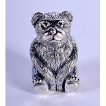 A SILVER TEDDY BEAR PIN CUSHION. 19 grams. 3 cm x 1.5 cm.