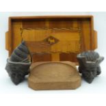 Two carved wooden heads together with a marquetry tray and a wooden dish .43cm (4)