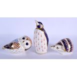 Royal Crown Derby paperweights: no mark, no stopper, Penguin, hedgehog, and owl. 14cm high (3)