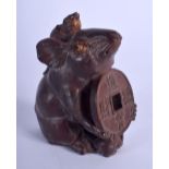 A JAPANESE CARVED BOXWOOD OKIMONO modelled as a mouse. 8 cm x 5 cm.