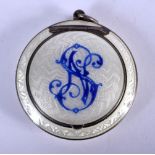 AN ANTIQUE RUSSIAN SILVER AND ENAMEL BOX painted with a monogram. 28 grams. 3.5 cm diameter.