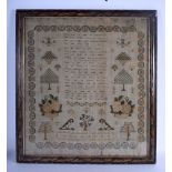 AN EARLY 19TH CENTURY ENGLISH FRAMED EMBROIDERED SAMPLER by Ann Mountain, aged nine years, C1839. Sa