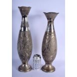 A LARGE NEAR PAIR OF ANTIQUE MIDDLE EASTERN PERSIAN VASES. 2236 grams. 49 cm x 12 cm.