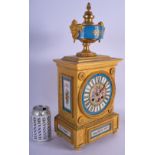 A 19TH CENTURY FRENCH SEVRES PORCELAIN GILT BRONZE MANTEL CLOCK painted with putti in various pursui