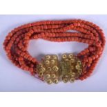 AN 18CT GOLD MOUNTED CONTINENTAL CORAL NECKLACE. 236 grams. Each strand 30 cm long.