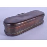 AN EARLY 18TH CENTURY EUROPEAN OVAL FORMED BRONZE TOBACCO BOX decorated in a naive manner with engra