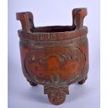 A RARE EARLY 20TH CENTURY CHINESE TWIN HANDLED CARVED BAMBOO CENSER Late Qing, decorated with taotie