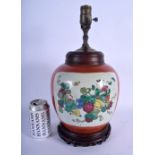 A LATE 19TH CENTURY CHINESE CORAL GROUND PORCELAIN GINGER JAR Guangxu, converted to a lamp. Porcelai