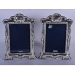 A PAIR OF 1970S ENGLISH SILVER PHOTOGRAPH FRAMES. 22 cm x 16 cm.