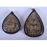 TWO SOUTH EAST ASIAN WHITE METAL AND STONE PENDANTS 20th Century. Largest 6.75 cm x 5 cm.