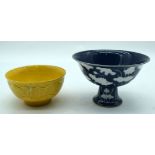 A Chinese blue and white stem cup together with a yellow ground bowl 10 x 16cm (2).