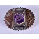 A VINTAGE SILVER AND AMETHYST BROOCH. 7 gras. 3.5 cm x 3 cm.