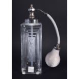 A BOXED LALIQUE GLASS SCENT BOTTLE decorated with a nude female. Bottle 19 cm high.